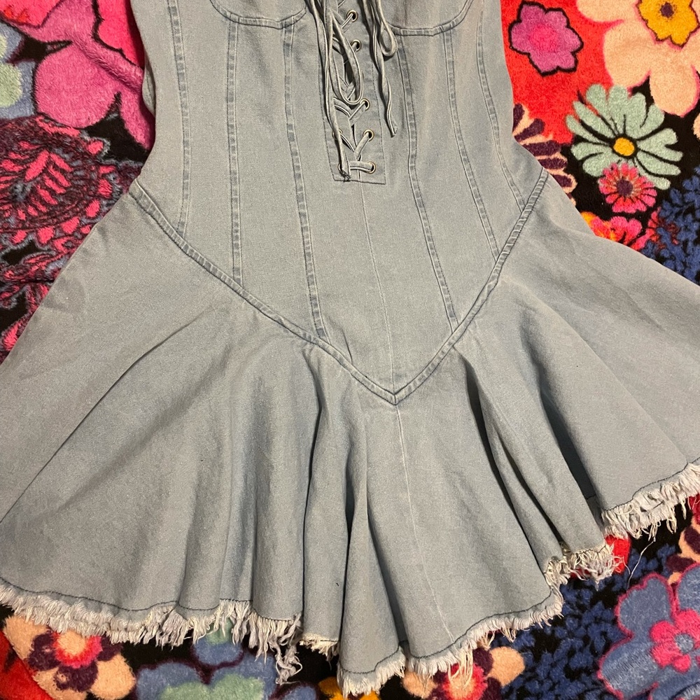 Beautiful unique jean dress. Hooks like a bodysuit